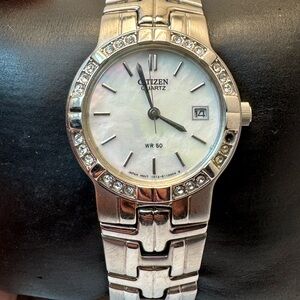 Women’s citizen courts Silvertone band dress watch MOP dial EU2670-56D H33